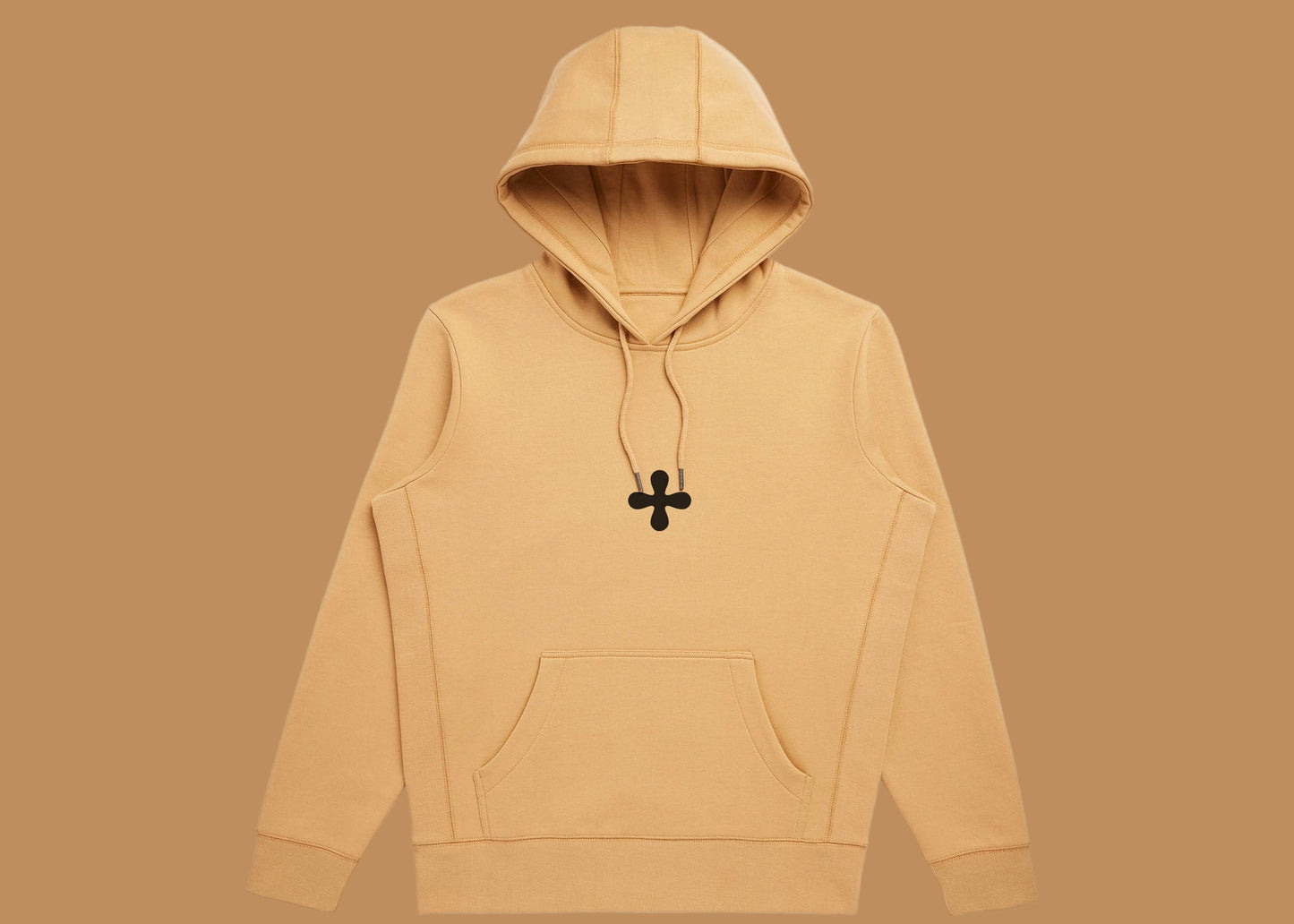 Beige hoodie with a black pendant on a white background