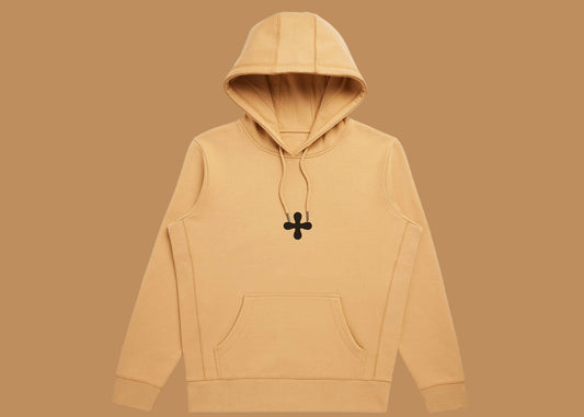 Beige hoodie with a black pendant on a white background